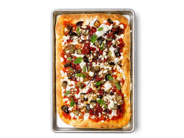 Wie man Pizza mit orientalischen Gewürzen zubereitet
