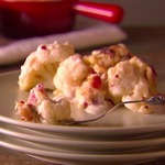 Blumenkohl mit Parmesan und Pancetta, in einer Milchsoße gebacken