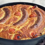 Auflauf mit Würstchen und Zwiebelsauce