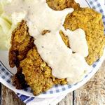 Gebratenes Hähnchen mit Milchsoße
