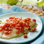 Tilapia mit Gemüse in Folie im Ofen