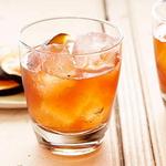 Negroni mit gebrannter Orange
