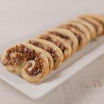 Palmier-Blätterteigtaschen mit Fleisch und Parmesan