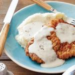 Knusprig panierte Rinderkoteletts mit Soße