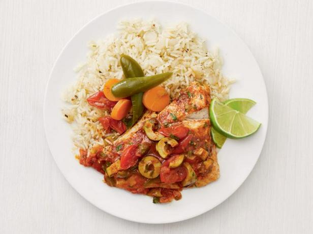 Zubereitung - Fisch in Tomatensoße mit Oliven aus dem Ofen