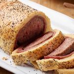Riesenwurst im Teig
