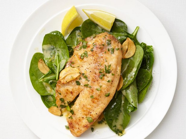 Tilapia mit Zitrone, Knoblauch und Spinat