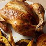 Ofengebackenes Hähnchen mit gebackenem Knoblauch und Orange