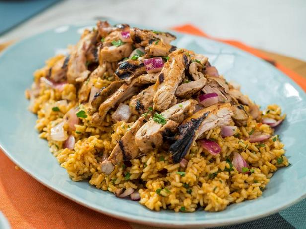 Rezept für süß-scharfe gebratene Hähnchenschenkel mit Reis
