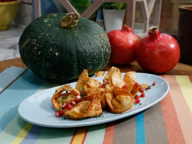 Wontons mit Kürbis und Shiitake-Pilzen in Granatapfelsirup